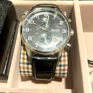 Hugo boss watch in black leather, gently used